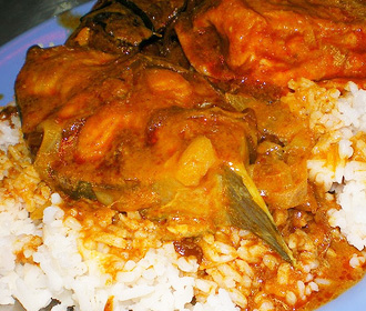 Pan-Fried Catfish curry over Rice